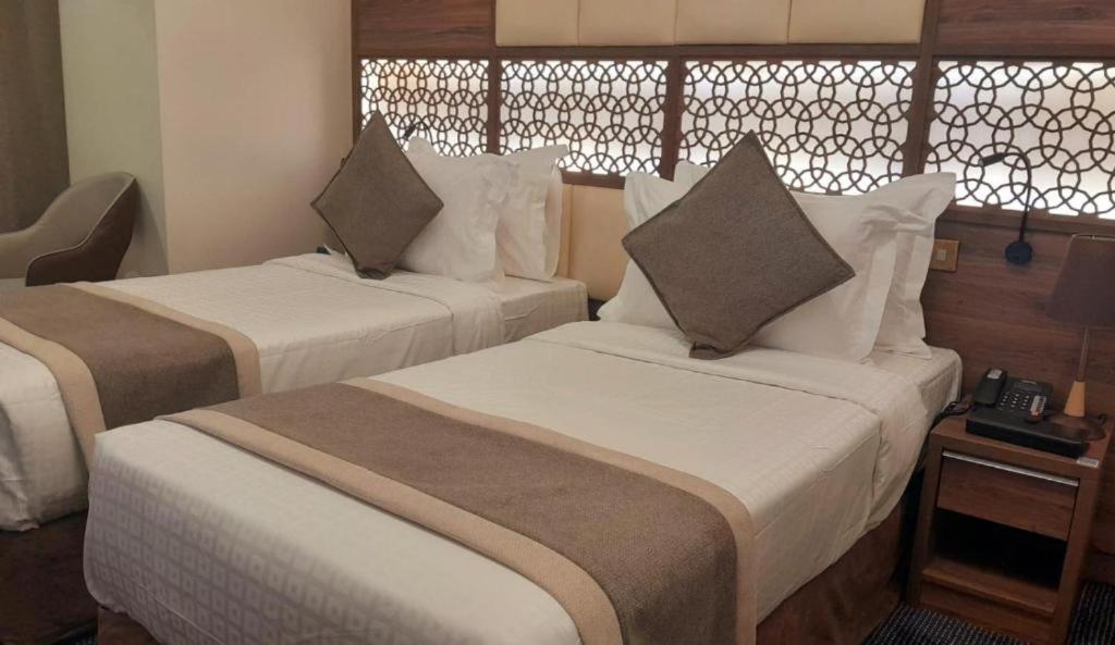Hotel Golden Tulip Al-Zahabi Medína Pokoj fotografie